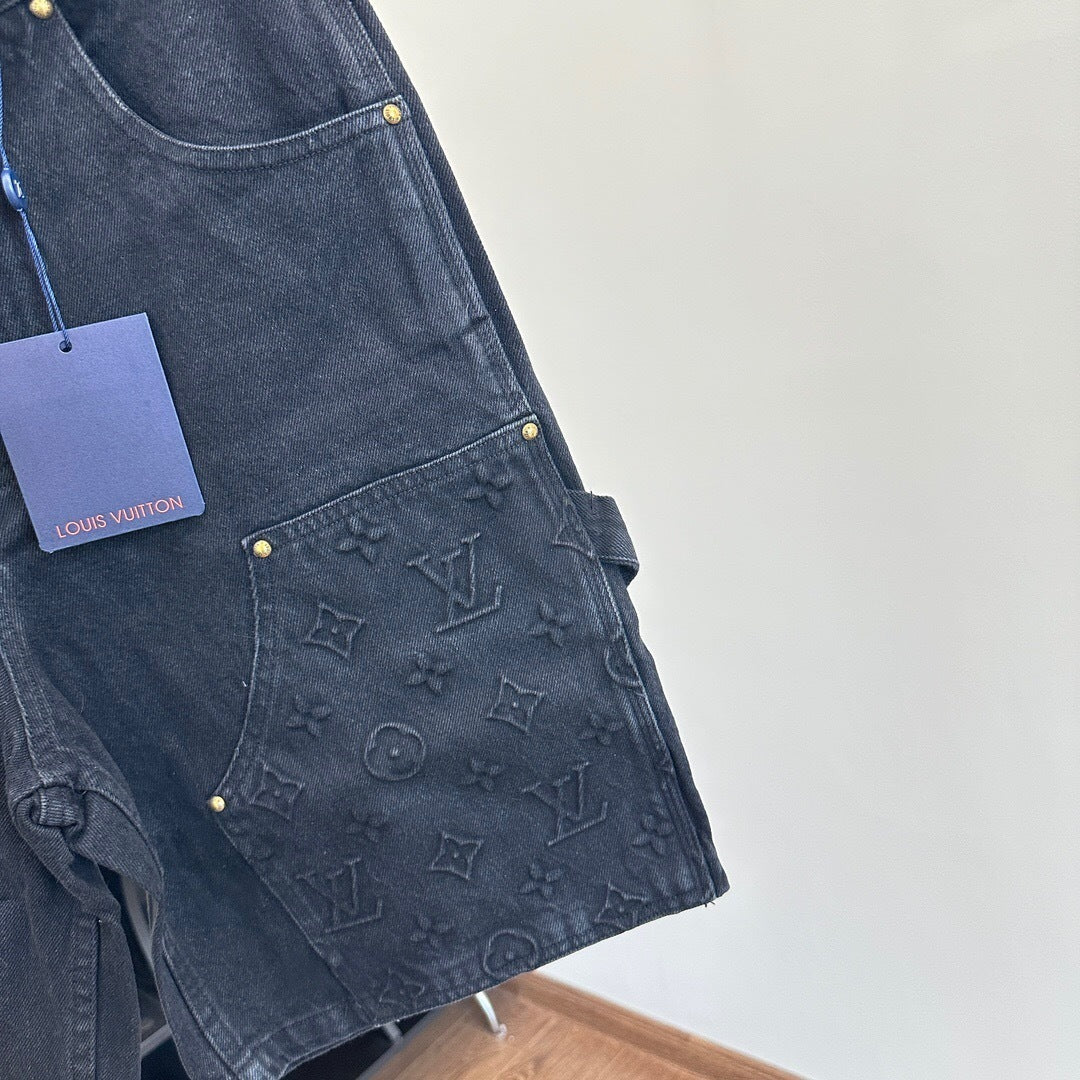 MONOGRAM EMBOSSED DENIM SHORTS