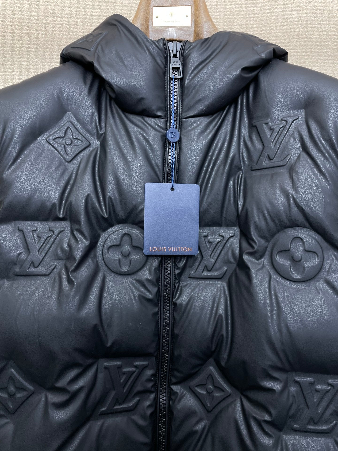 EMBOSSED PADDED HOODED VEST