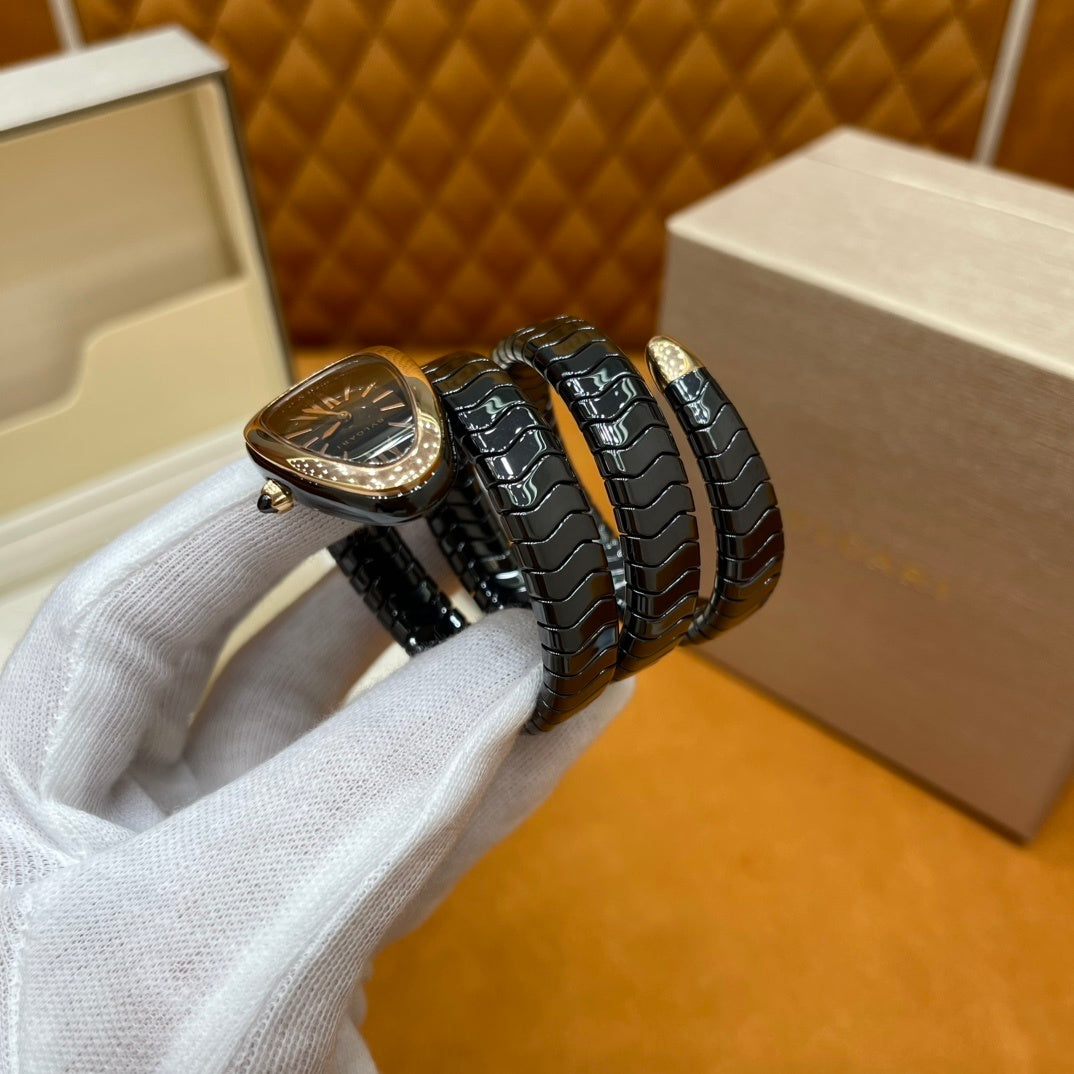 SERPENT WRAP WATCH – BLACK & GOLD ELEGANCE