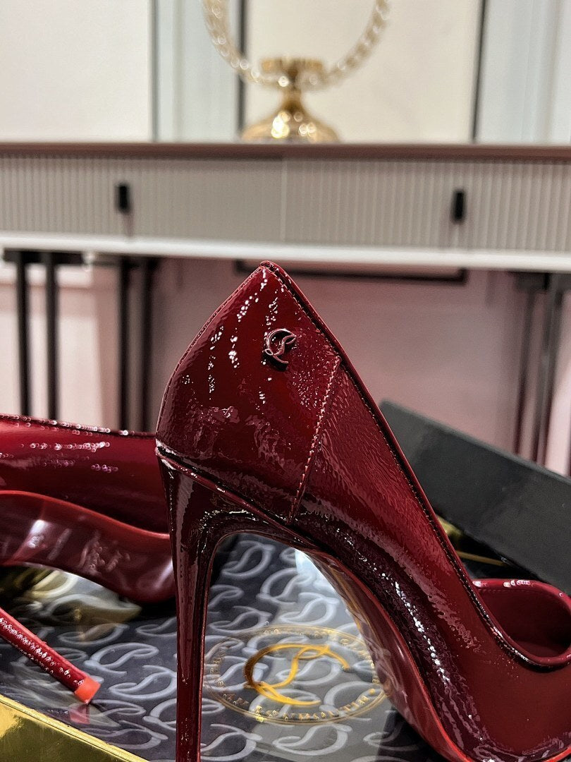 RED PATENT POINTED-TOE PUMPS