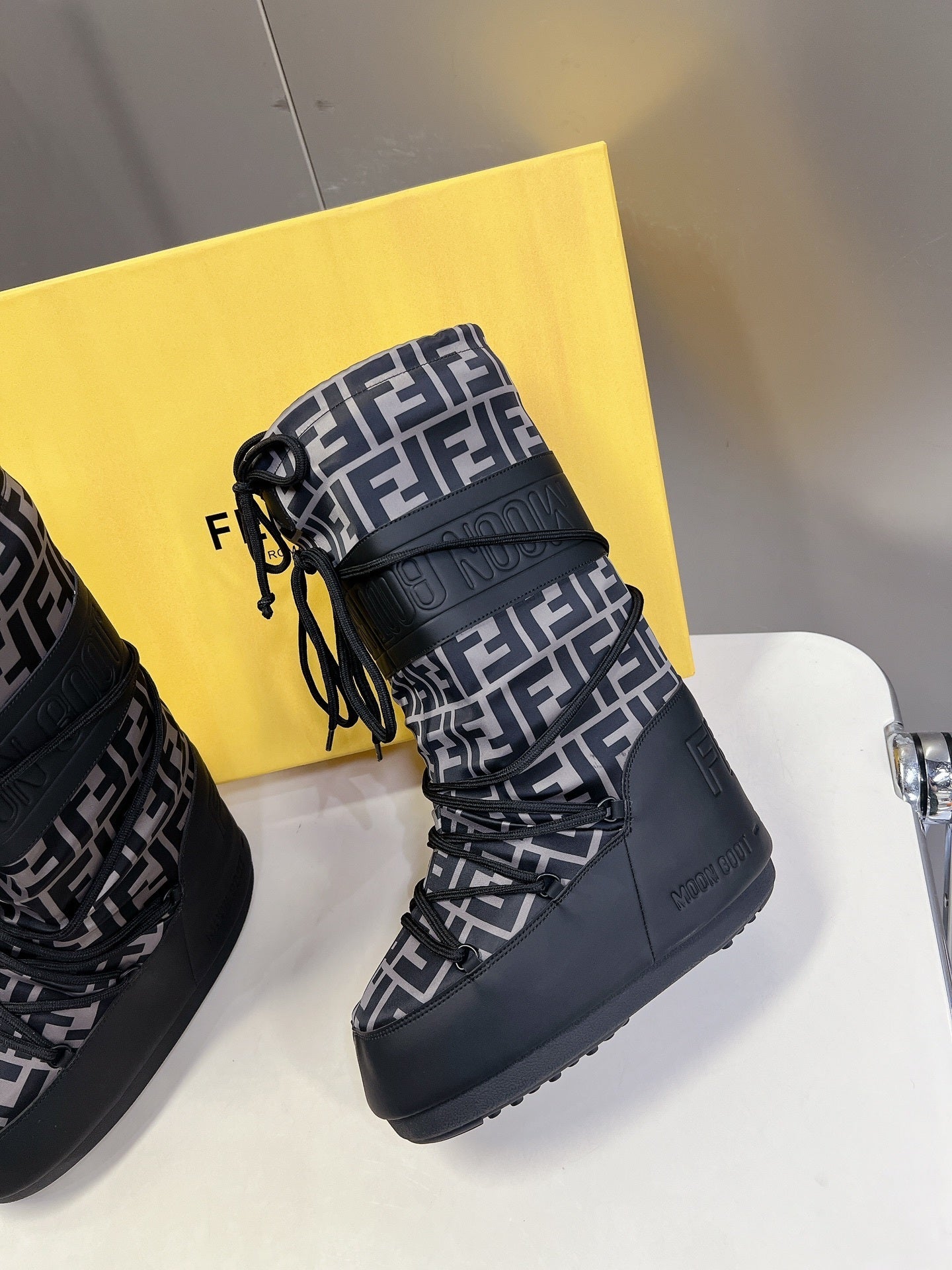 BLACK MONOGRAM-PRINT PADDED WINTER BOOTS