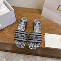 BLACK & WHITE TOILE LOGO SLIDE SANDALS