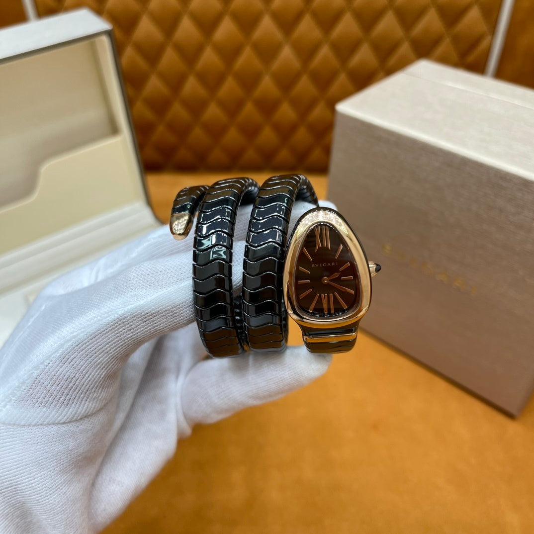 SERPENT WRAP WATCH – BLACK & GOLD ELEGANCE