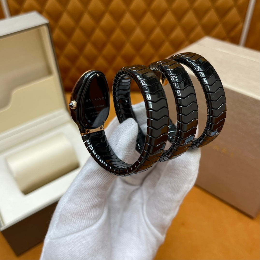 SERPENT WRAP WATCH – BLACK & GOLD ELEGANCE