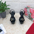BLACK PLATFORM SANDALS WITH GOLD-TONE HARDWARE