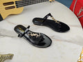 BLACK SLIDE SANDALS WITH GOLD DETAIL