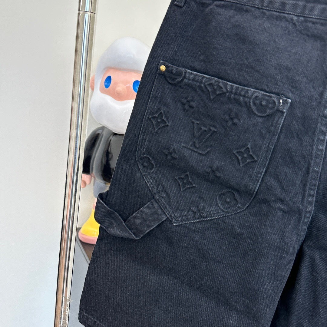 MONOGRAM EMBOSSED DENIM SHORTS