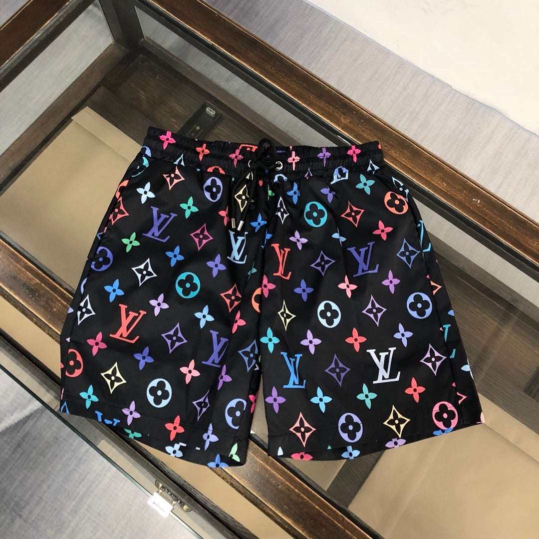 BLACK MULTICOLOR PRINT SWIM SHORTS