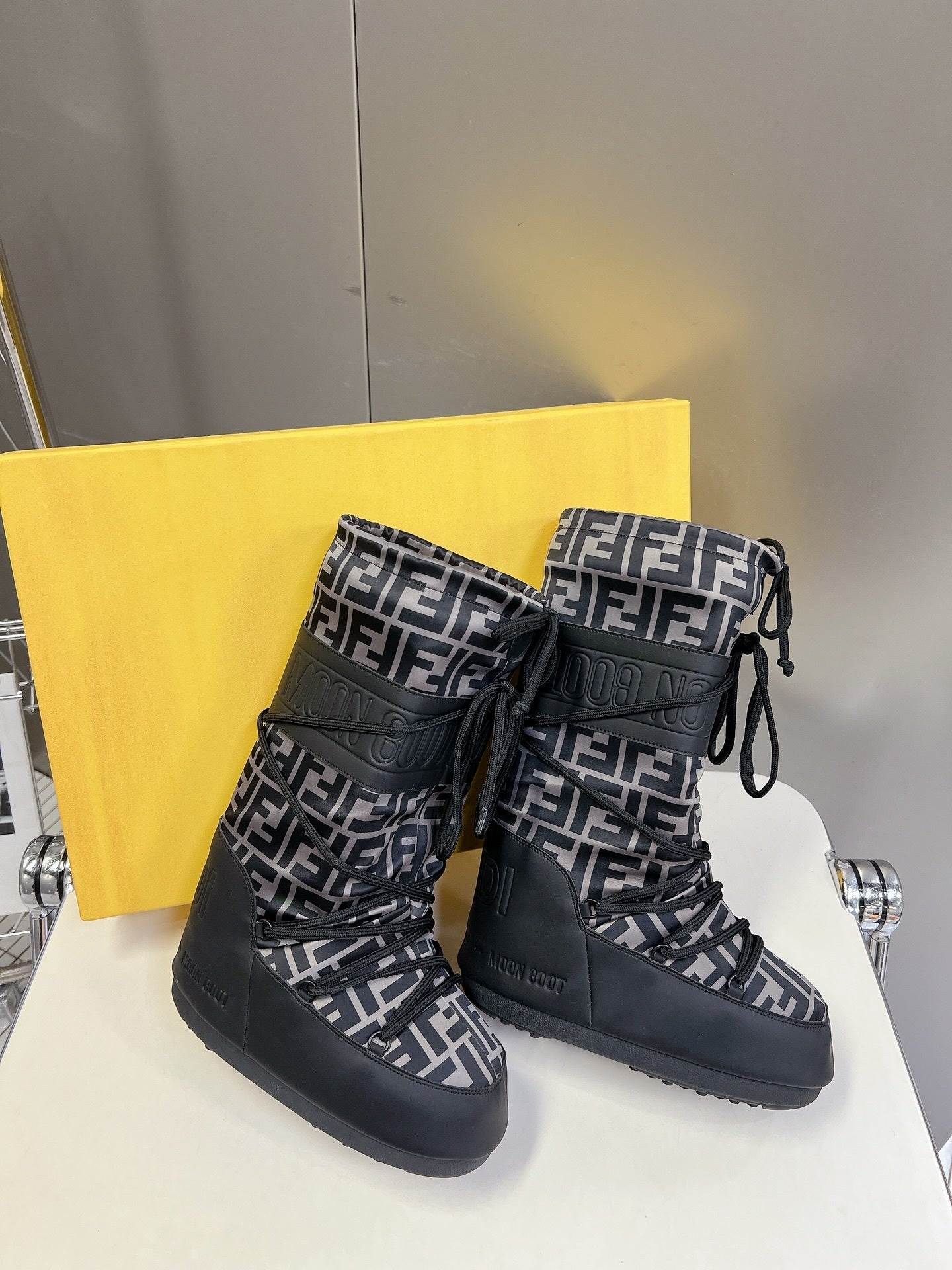 BLACK MONOGRAM-PRINT PADDED WINTER BOOTS