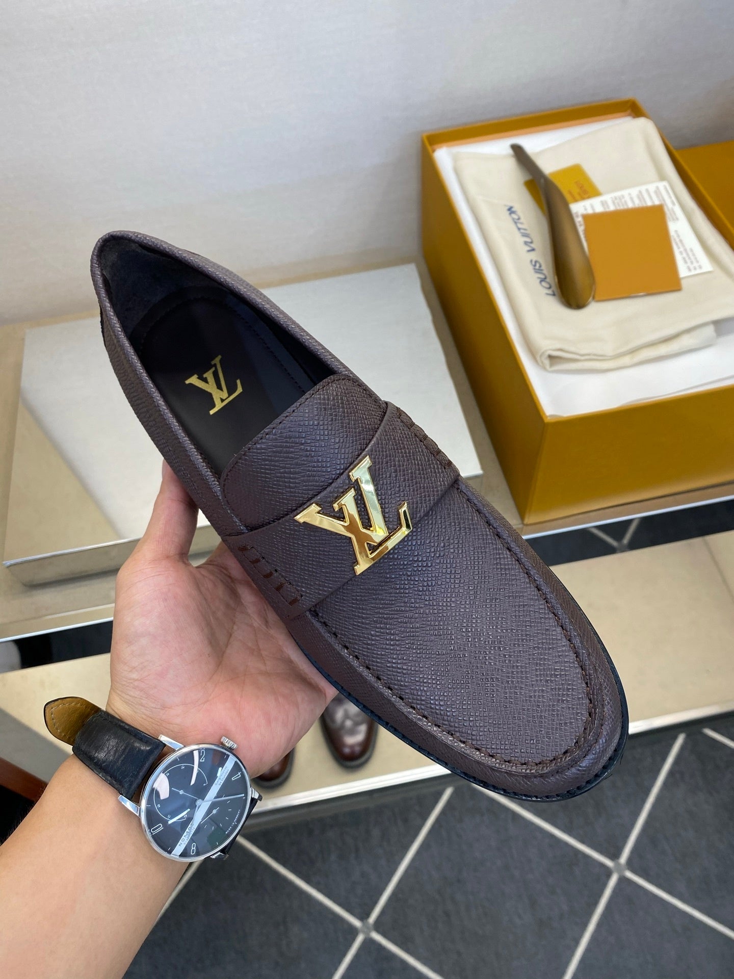 BROWN LEATHER SLIP-ON LOAFERS WITH GOLD-TONE ACCENT