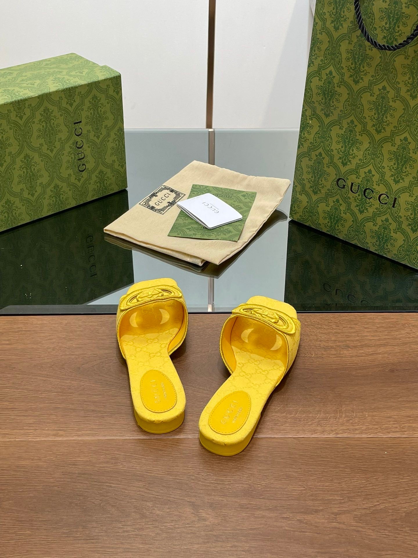 YELLOW EMBOSSED LOGO SLIDES