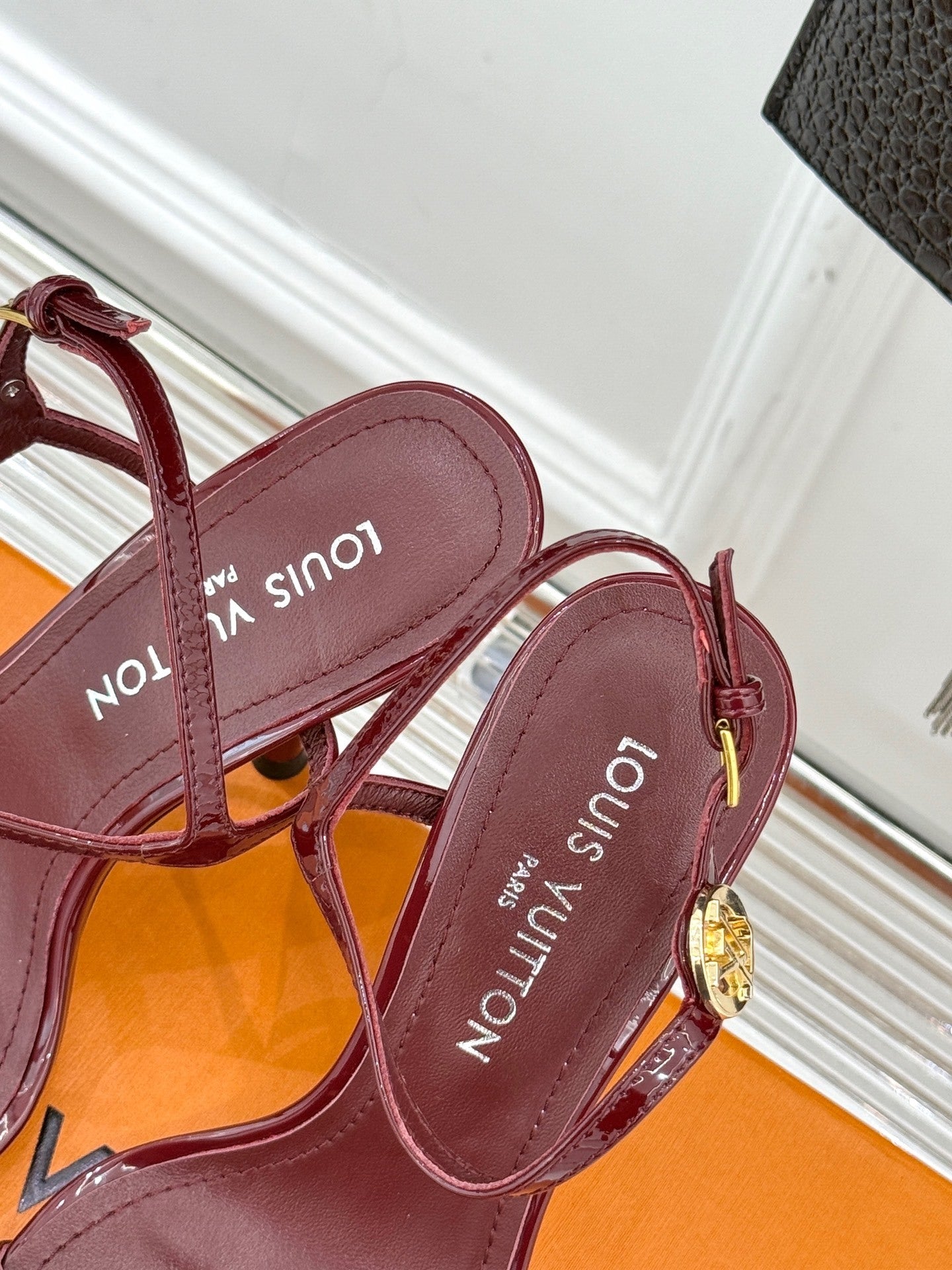 BURGUNDY PATENT LEATHER LOGO STRAP HEEL SANDALS