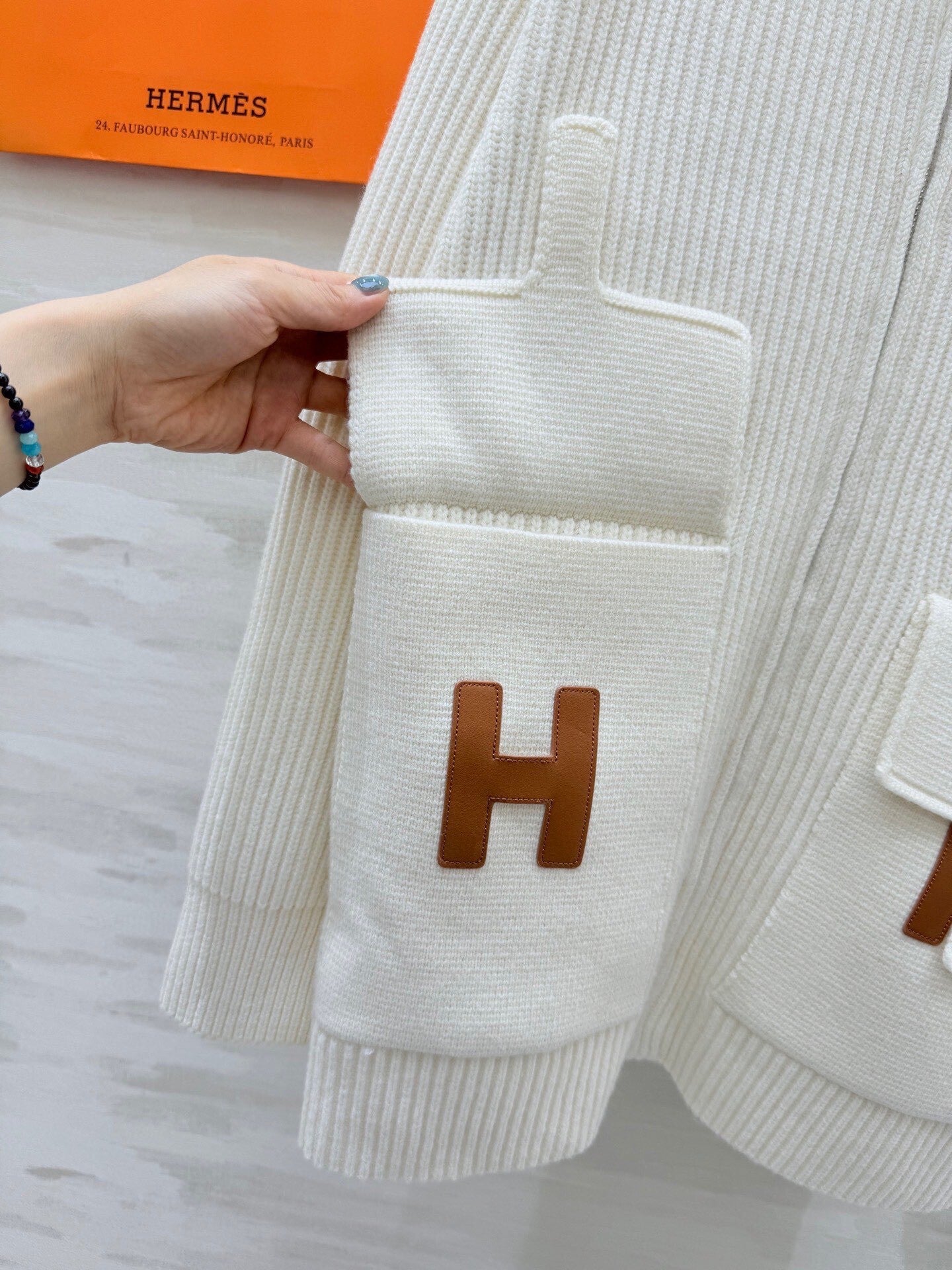 IVORY RIBBED KNIT ZIP CARDIGAN WITH FRONT FLAP POCKETS