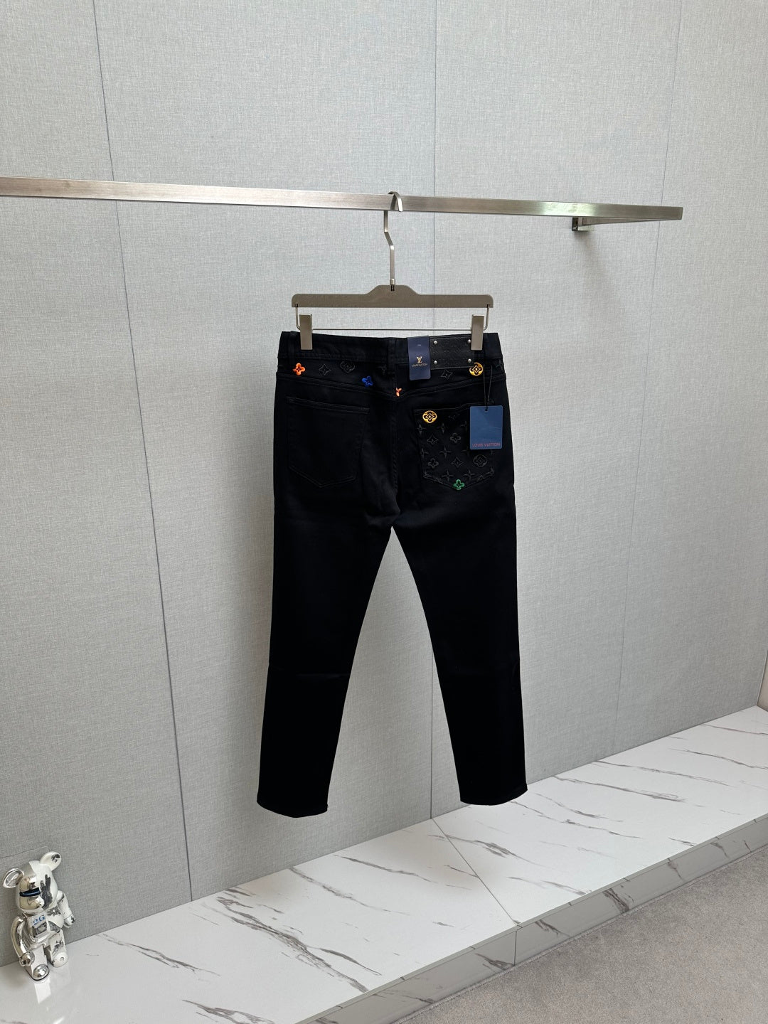 BLACK DENIM JEANS WITH EMBROIDERED DETAILING