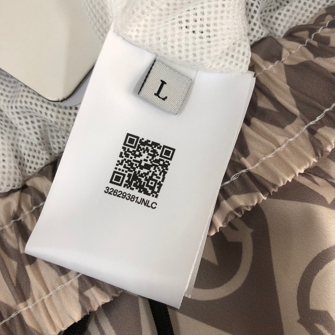 MONOGRAM PRINT SWIM SHORTS