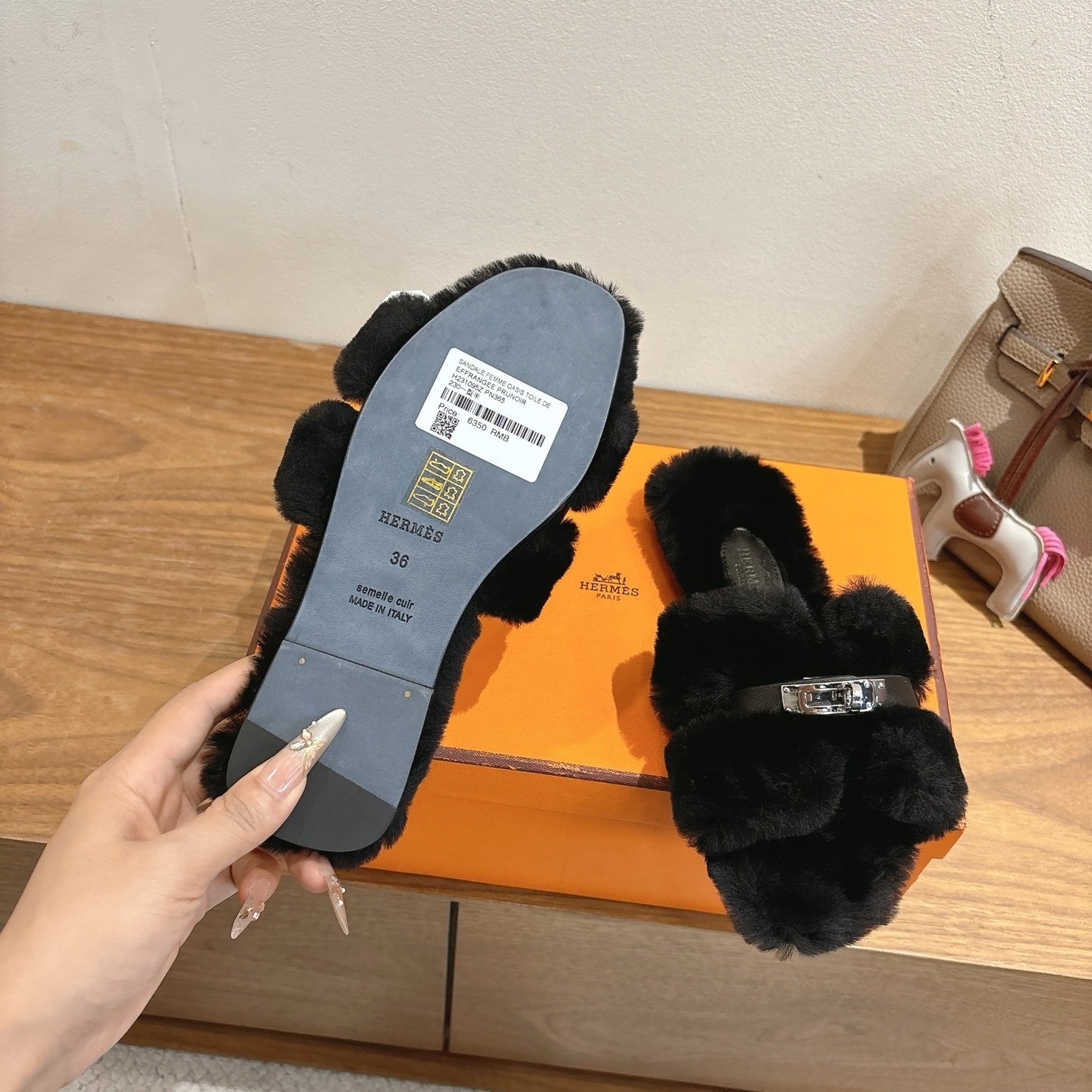 BLACK FAUX FUR MULE SLIPPERS WITH SILVER-TONE ACCENT