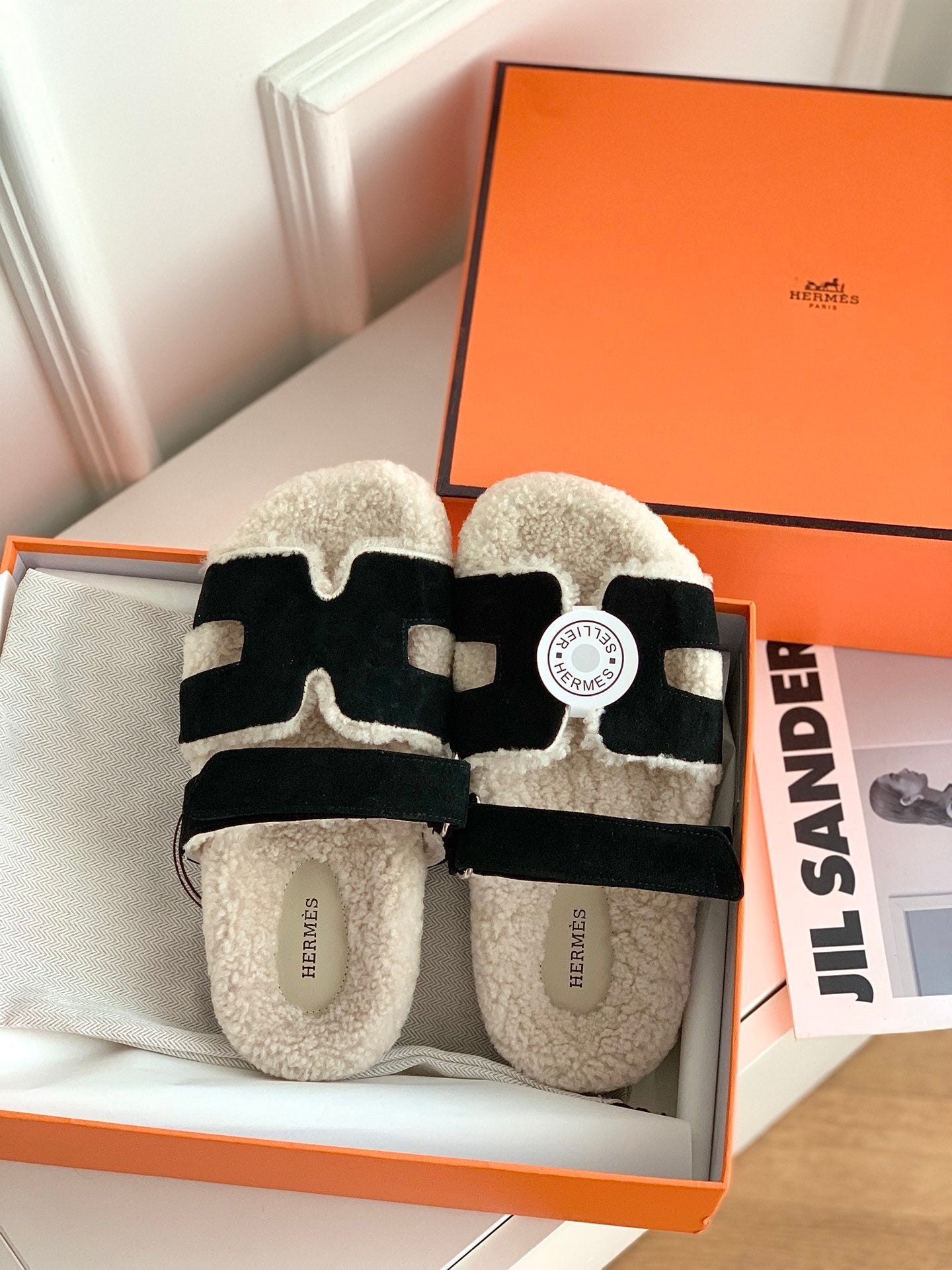 SHEARLING SLIDE SANDALS WITH BLACK STRAPS