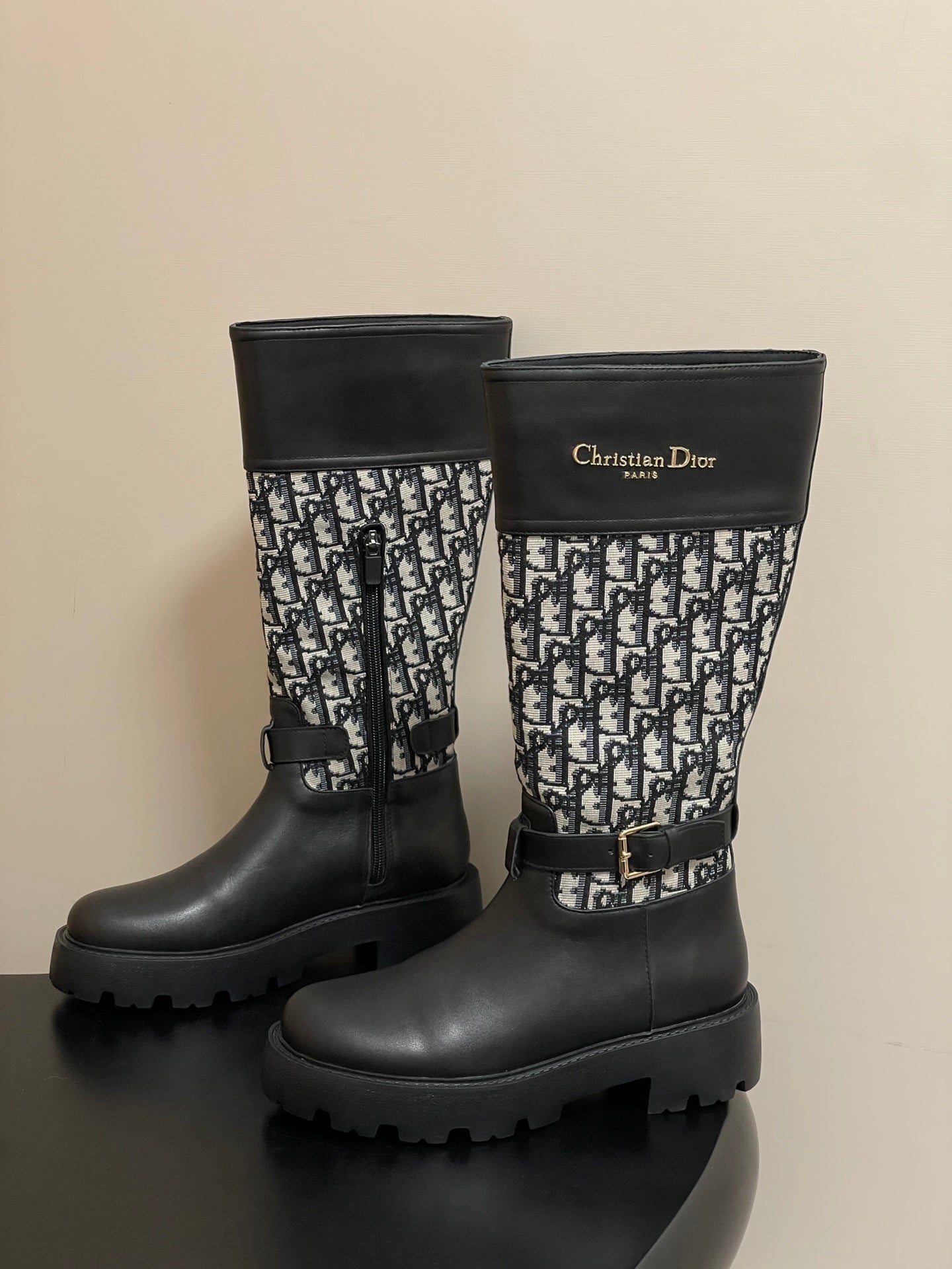 BLACK MID-CALF BOOTS WITH MONOGRAM FABRIC PANEL AND BUCKLE DETAIL