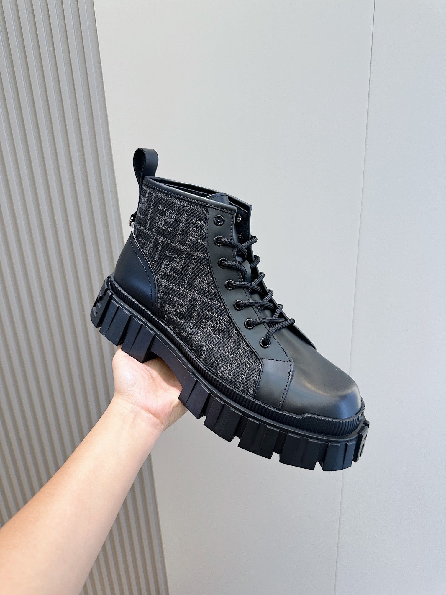 BLACK LACE-UP ANKLE BOOTS WITH MONOGRAM DETAIL AND CHUNKY SOLE