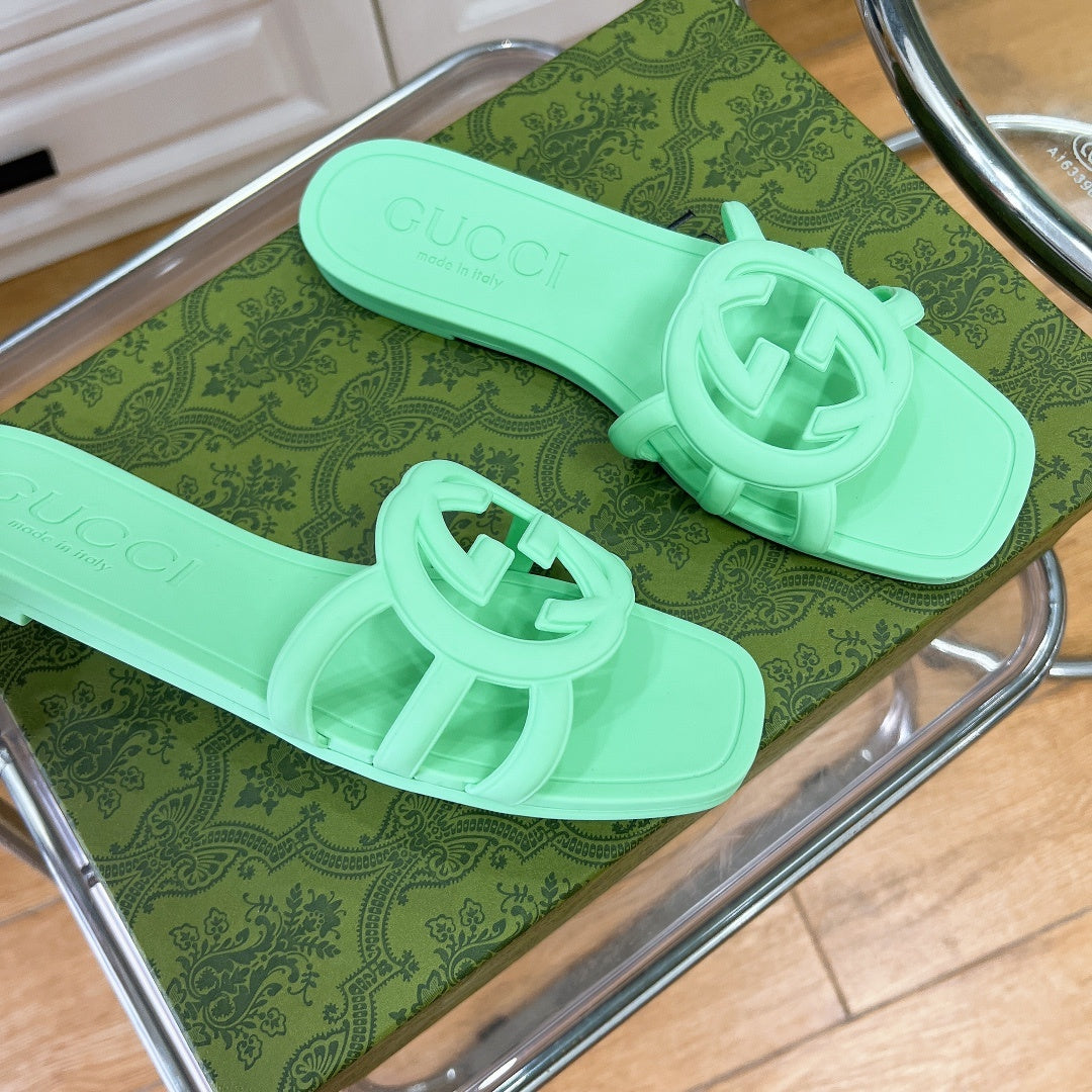 MINT GREEN RUBBER SLIDE SANDALS WITH ROUND EMBLEM