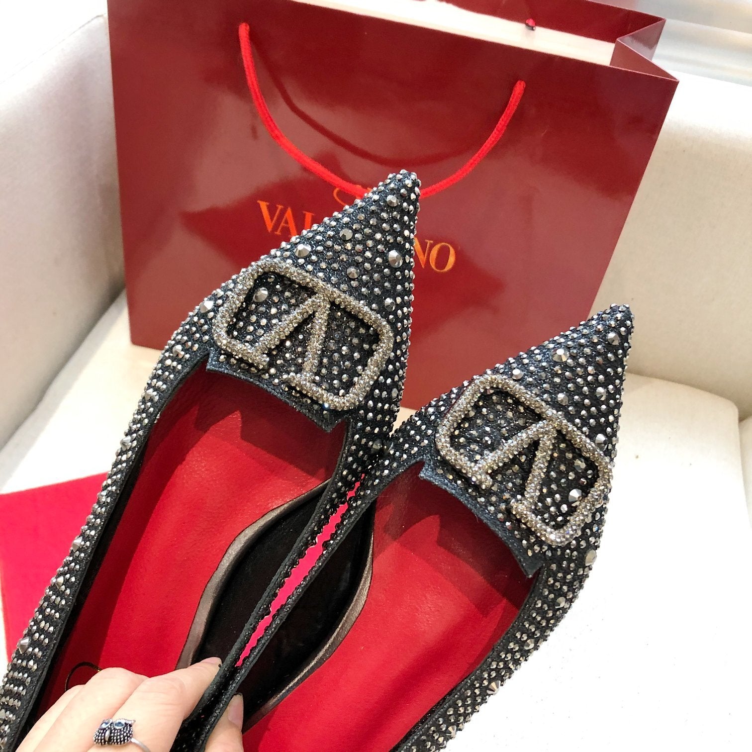 CRYSTAL EMBELLISHED POINTED FLATS WITH SIGNATURE BUCKLE