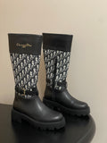 BLACK MID-CALF BOOTS WITH MONOGRAM FABRIC PANEL AND BUCKLE DETAIL