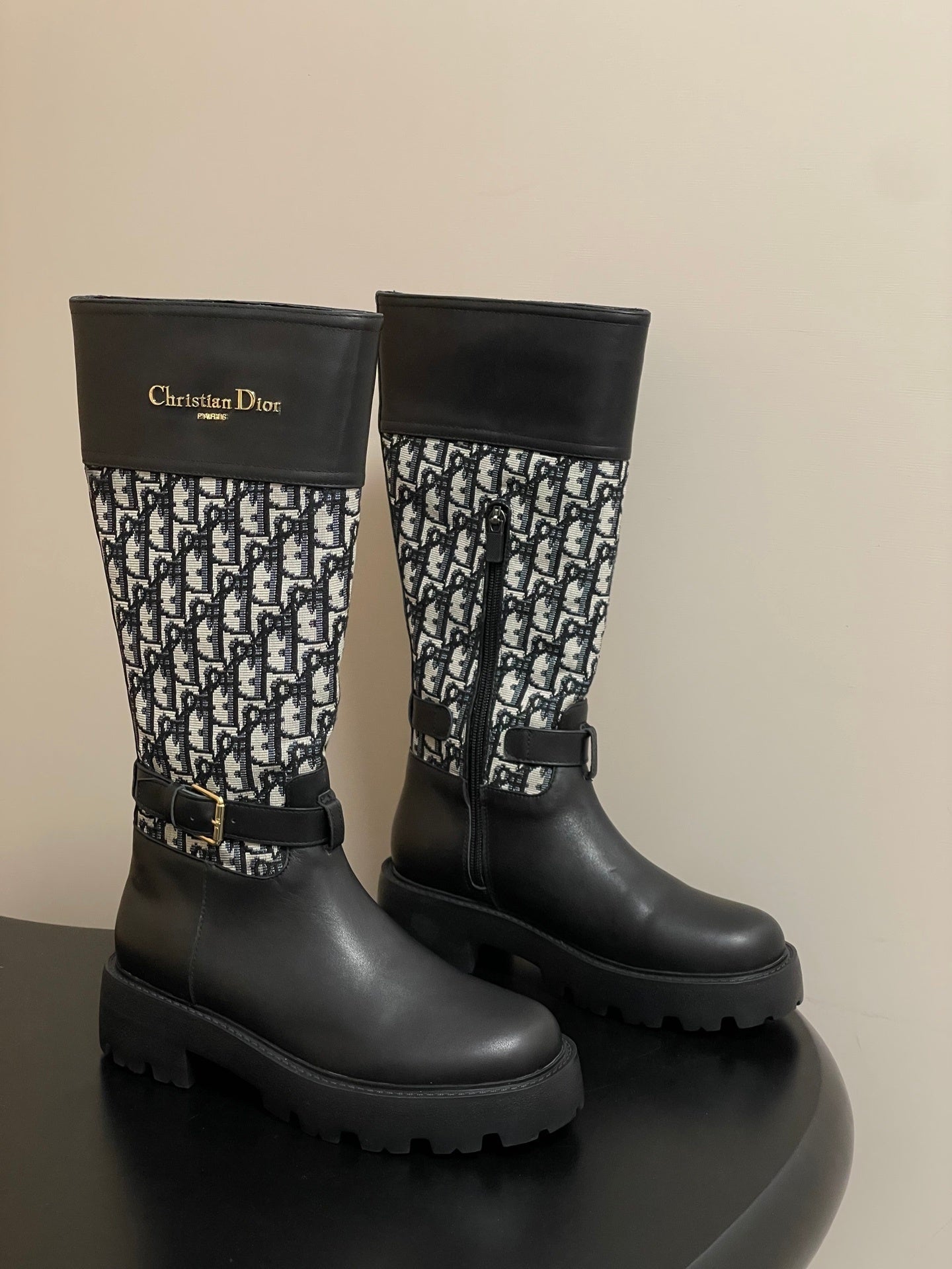 BLACK MID-CALF BOOTS WITH MONOGRAM FABRIC PANEL AND BUCKLE DETAIL