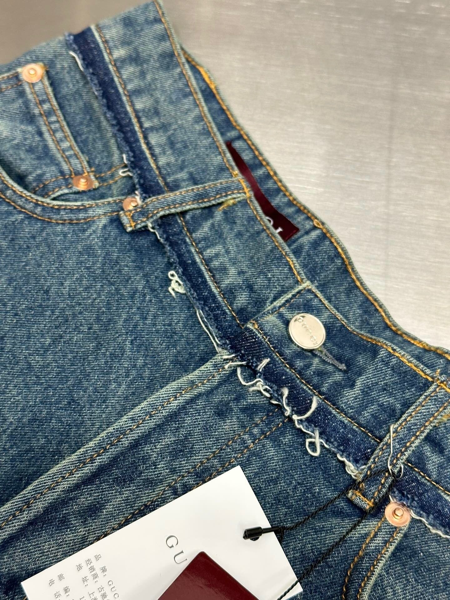 HIGH-WAIST RAW EDGE DENIM SHORTS