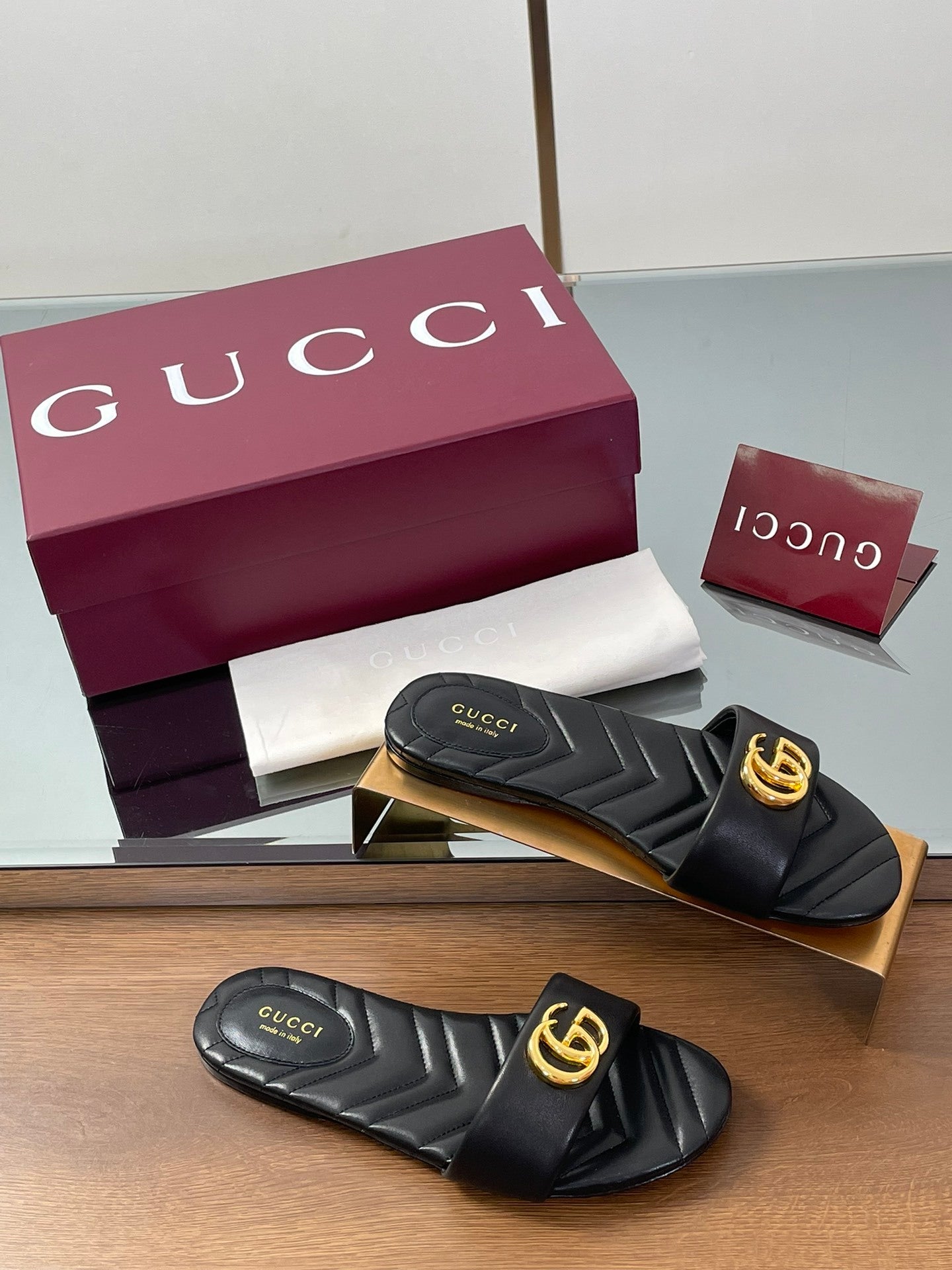 BLACK QUILTED SLIDE SANDALS
