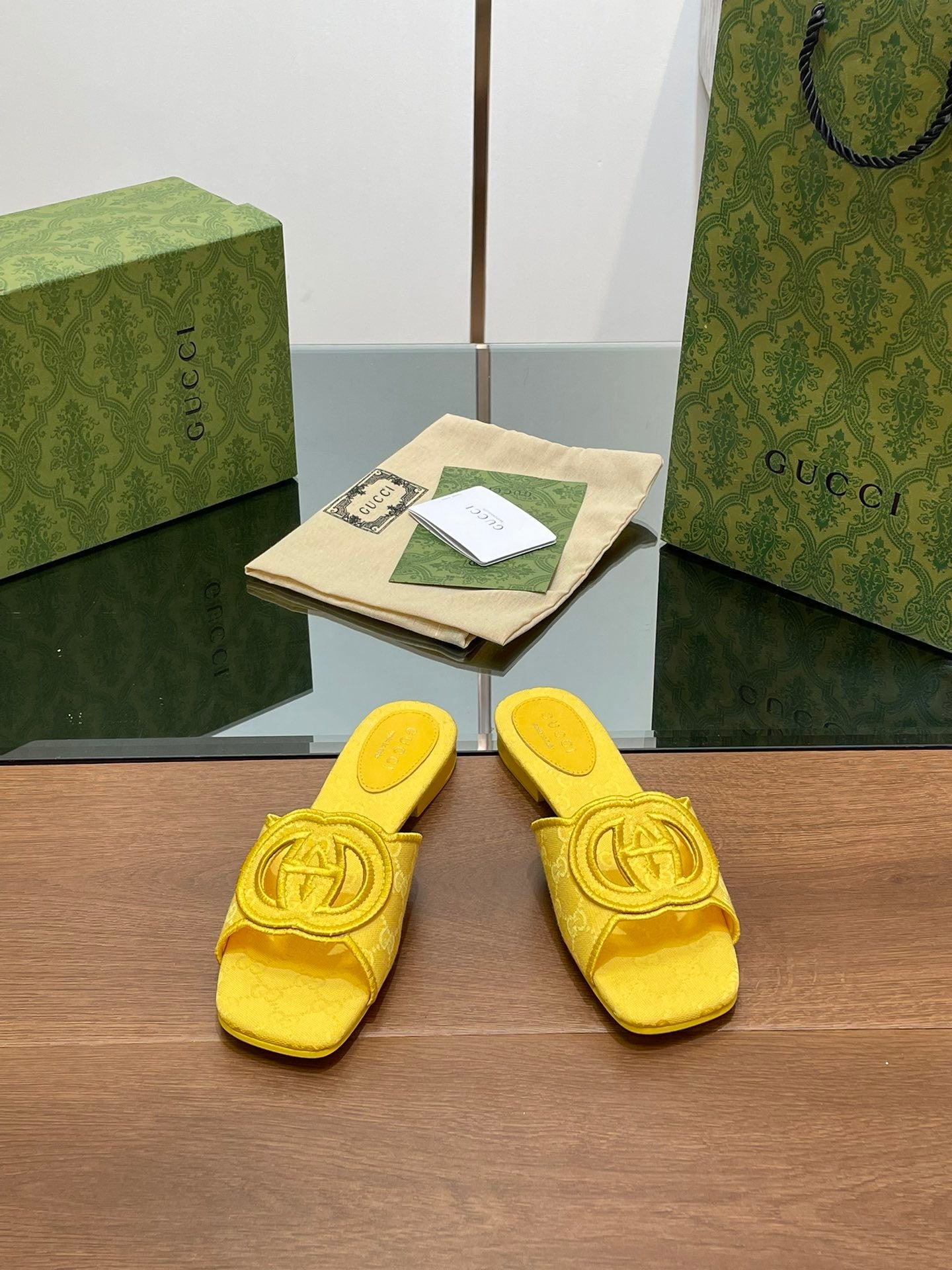 YELLOW EMBOSSED LOGO SLIDES
