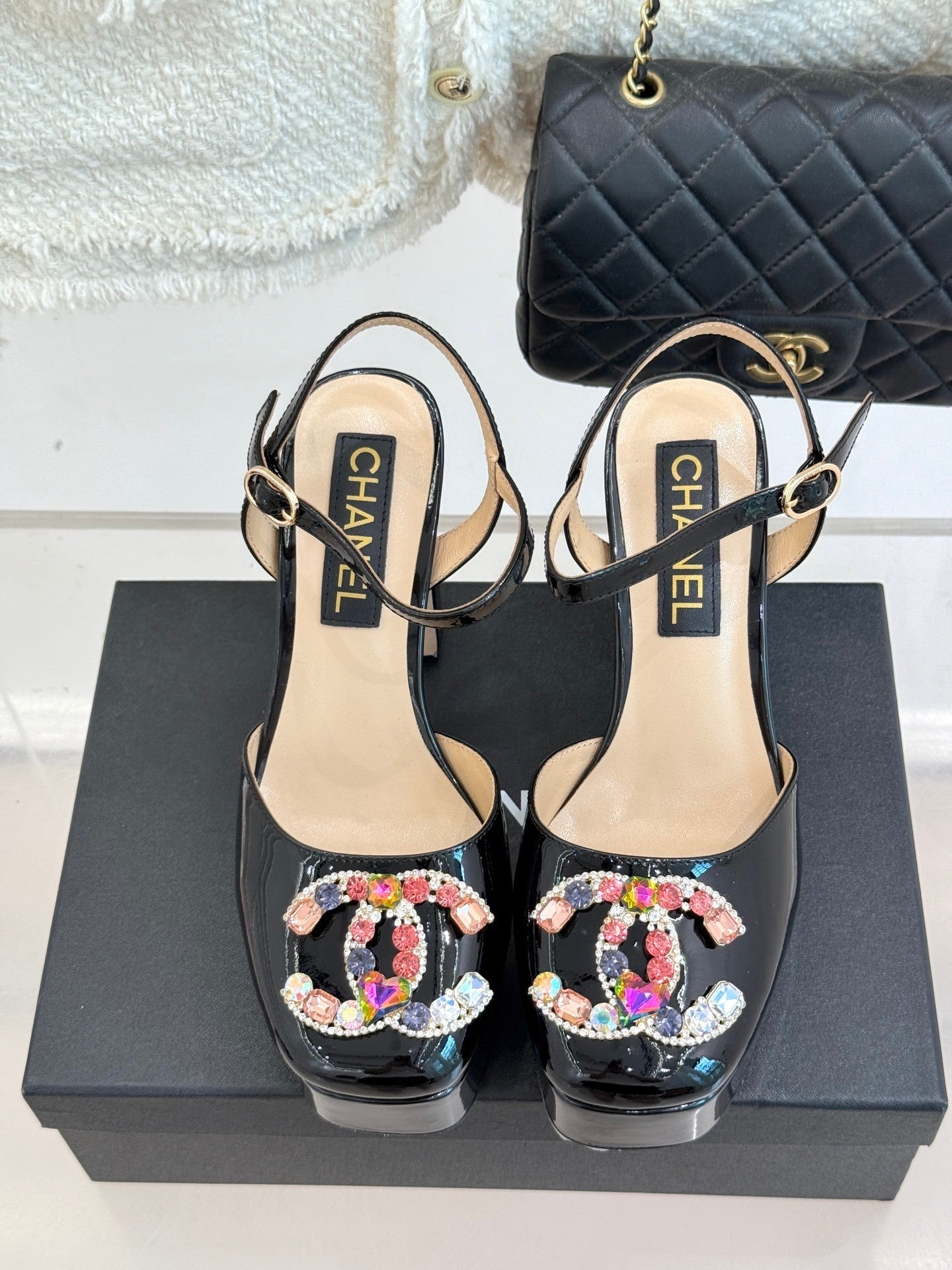 BLACK PATENT PLATFORM CRYSTAL HEELS