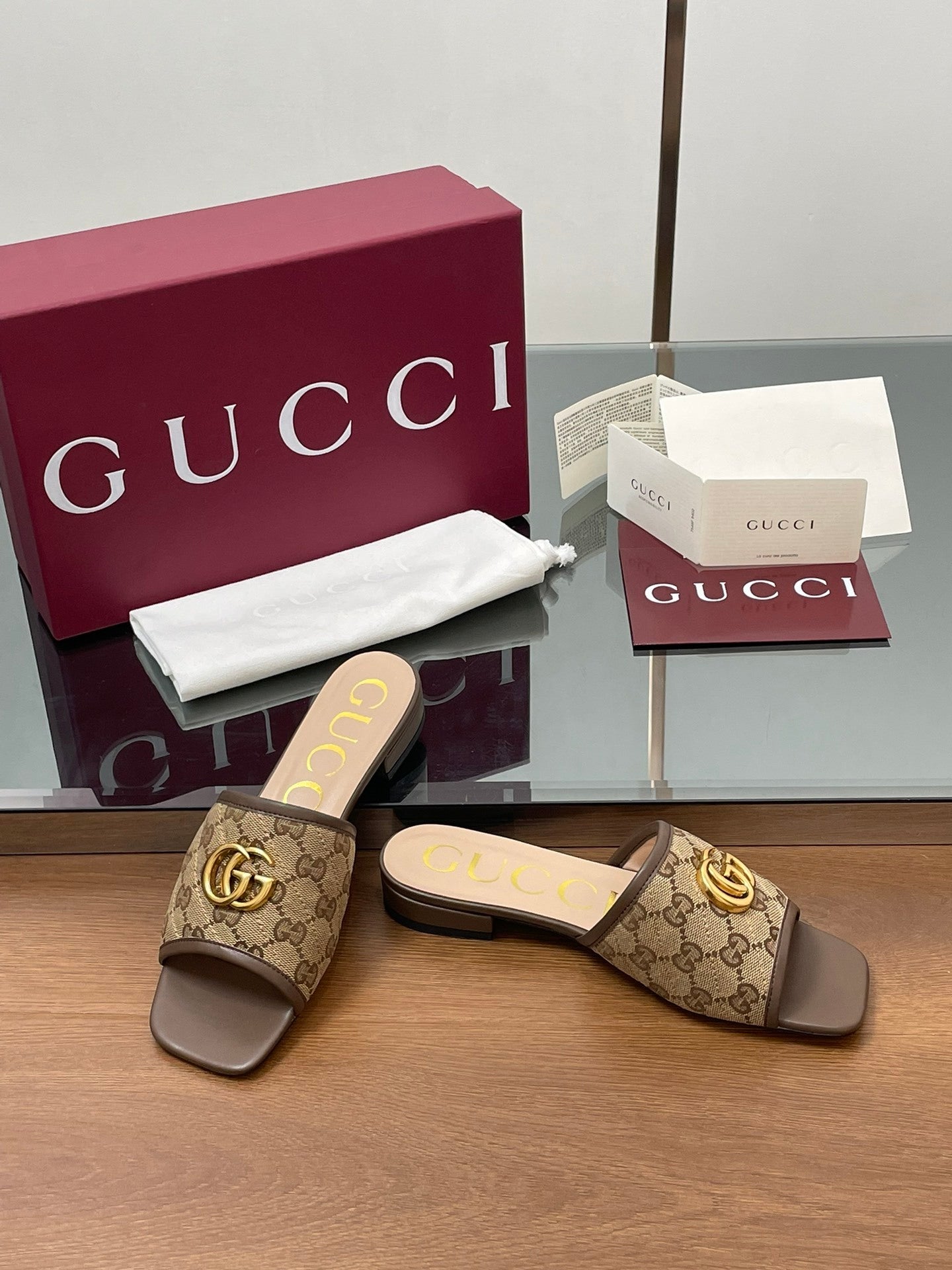 BROWN MONOGRAM FLAT SLIDES