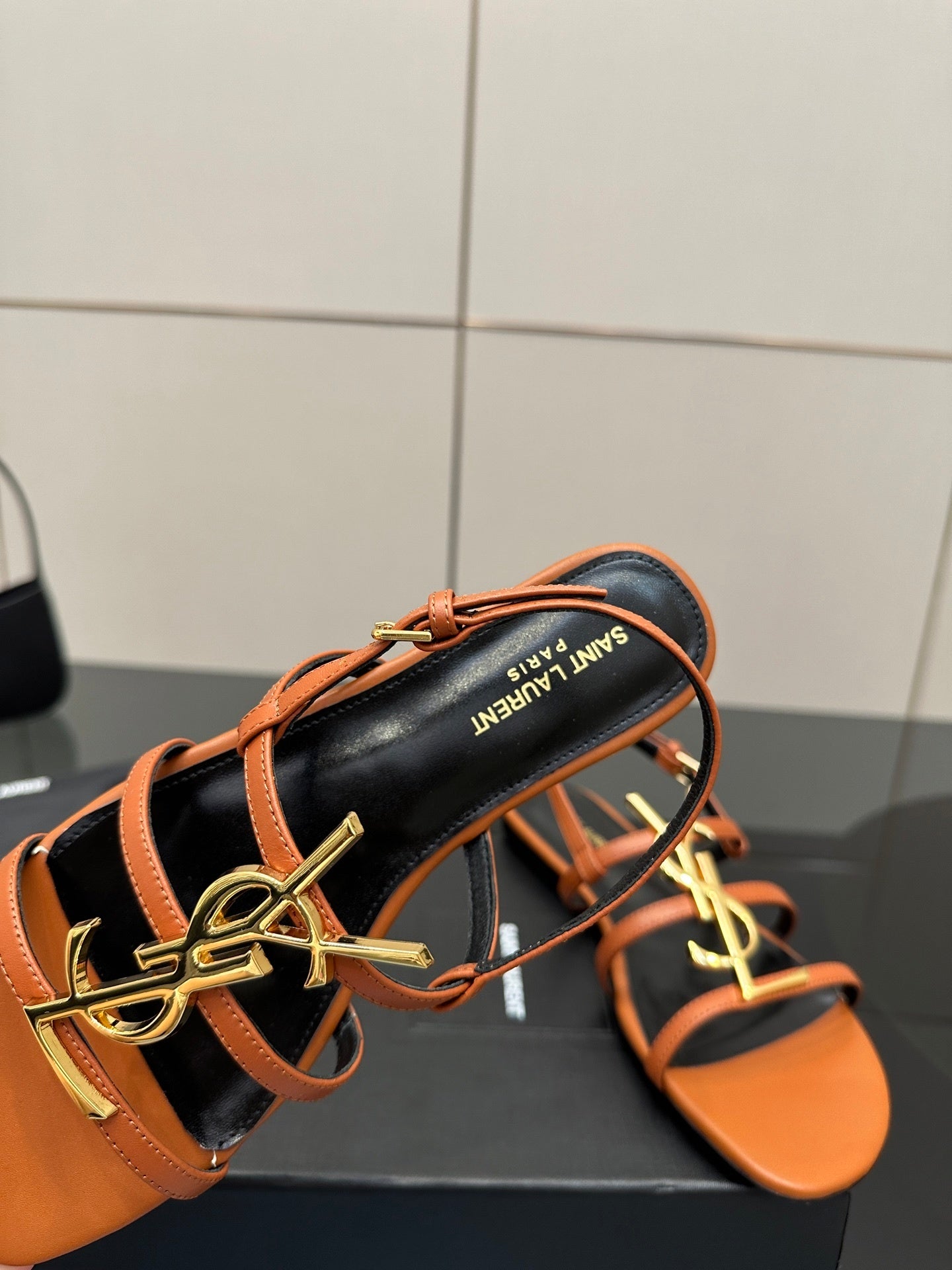 TAN STRAPPY FLAT SANDALS WITH GOLD LOGO DETAIL