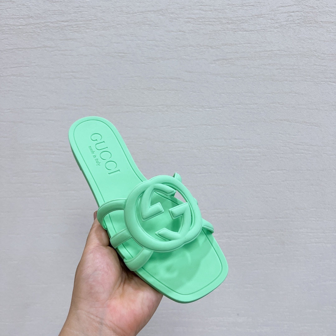 MINT GREEN RUBBER SLIDE SANDALS WITH ROUND EMBLEM
