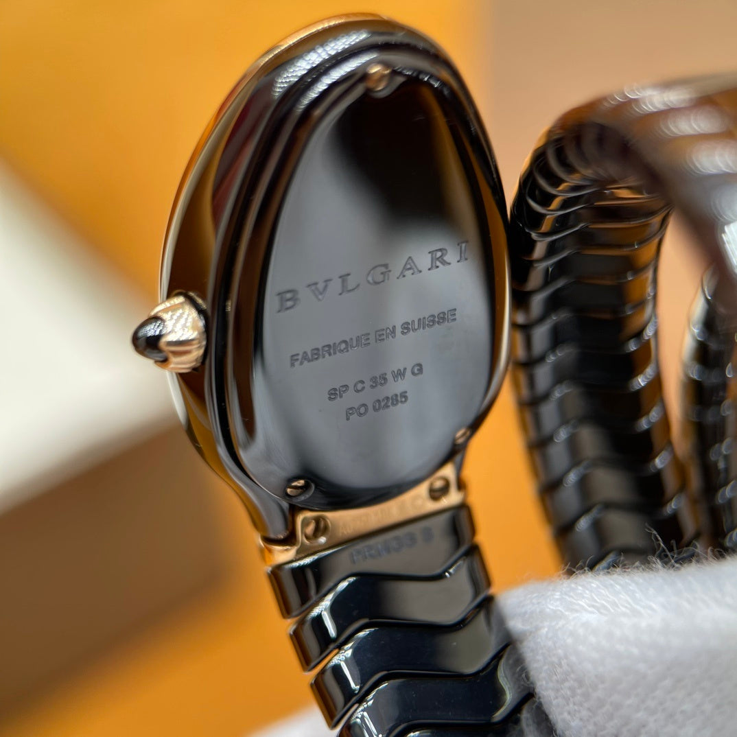 SERPENT WRAP WATCH – BLACK & GOLD ELEGANCE