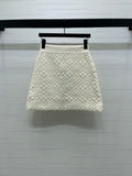 TEXTURED QUILTED KNIT MINI SKIRT