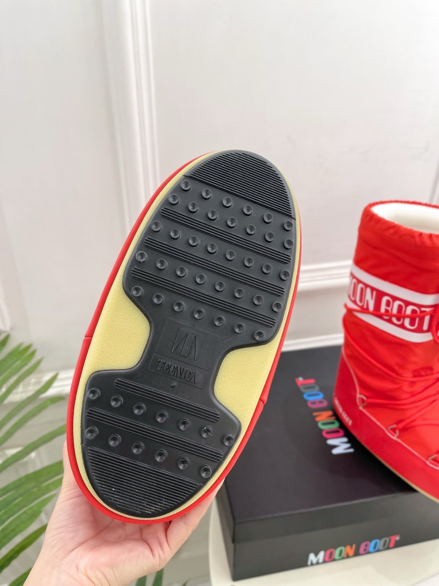 RED PADDED LACE-UP WINTER BOOTS