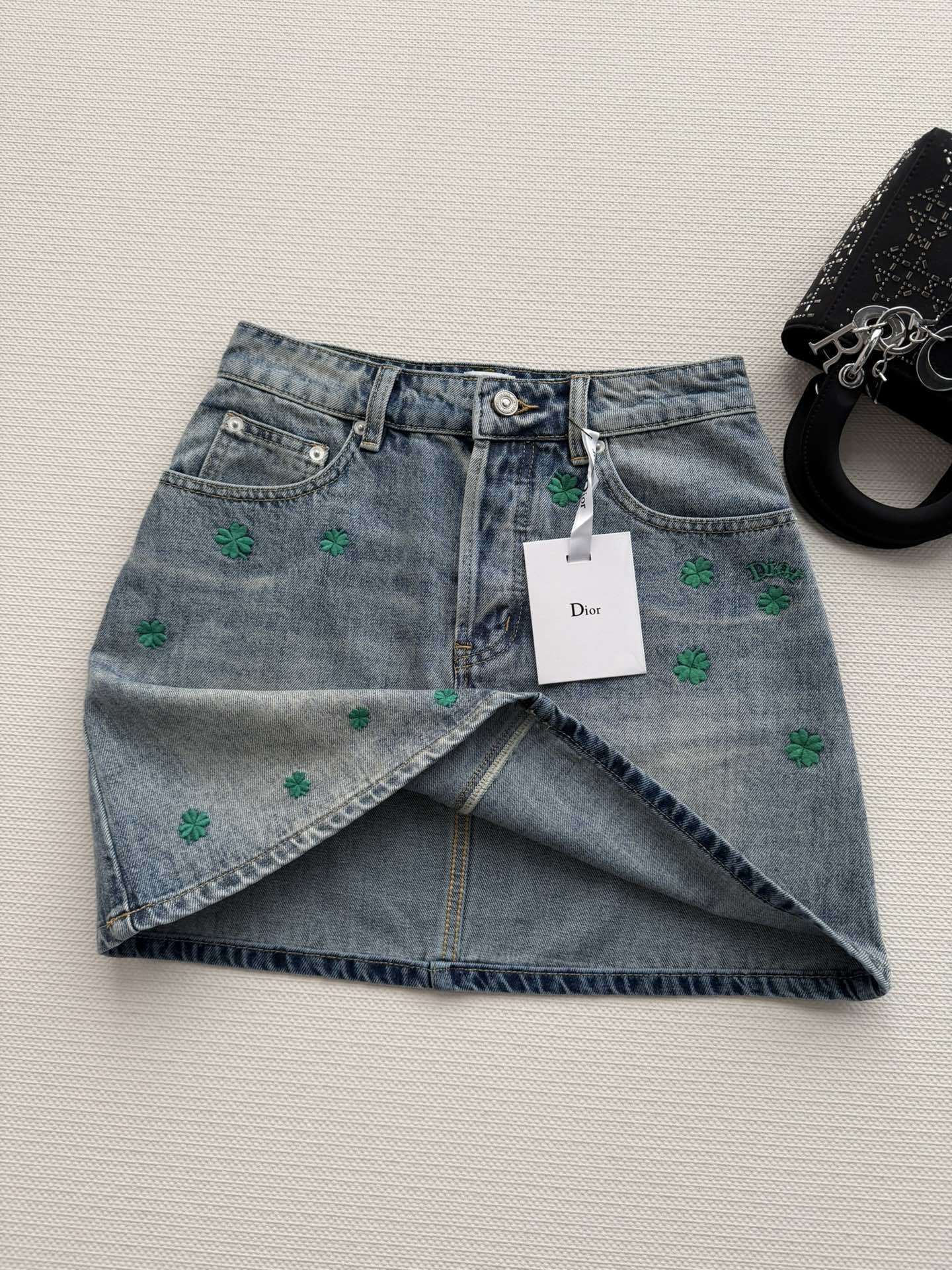 BLUE DENIM MINI SKIRT WITH FLORAL EMBROIDERY