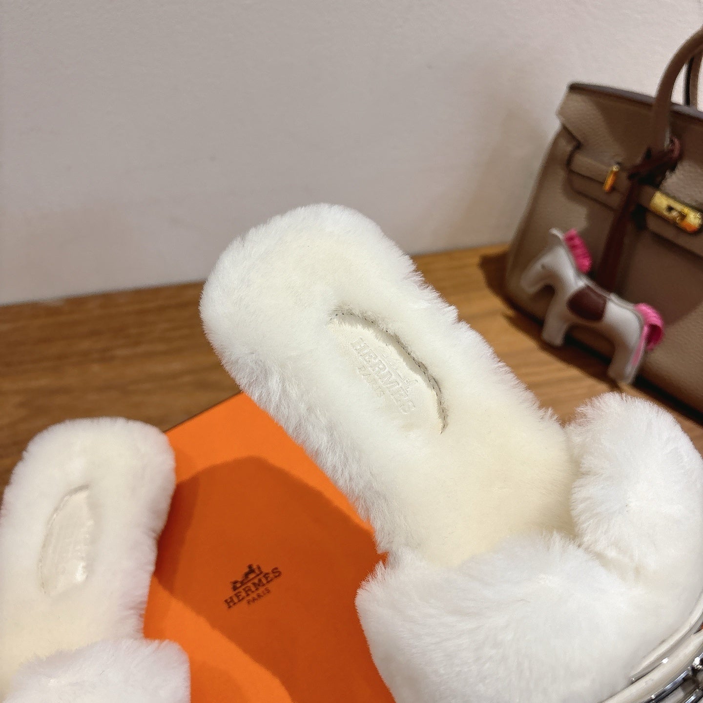 IVORY FAUX FUR MULE SLIPPERS WITH SILVER-TONE ACCENT