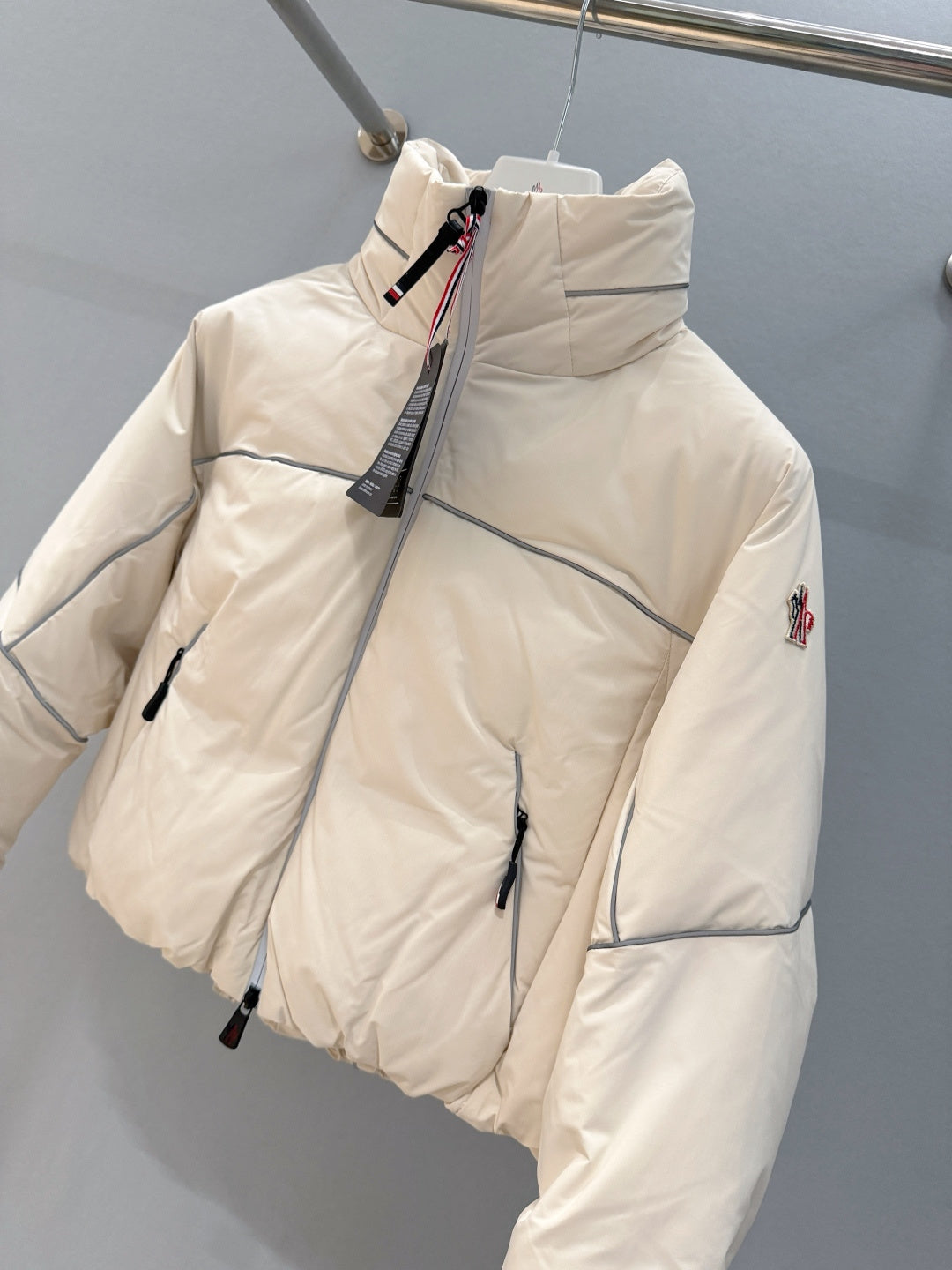 CROPPED PADDED JACKET WITH HIGH COLLAR AND TECH DETAILS