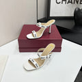 CRISP WHITE LOGO STRAP STILETTO SANDALS