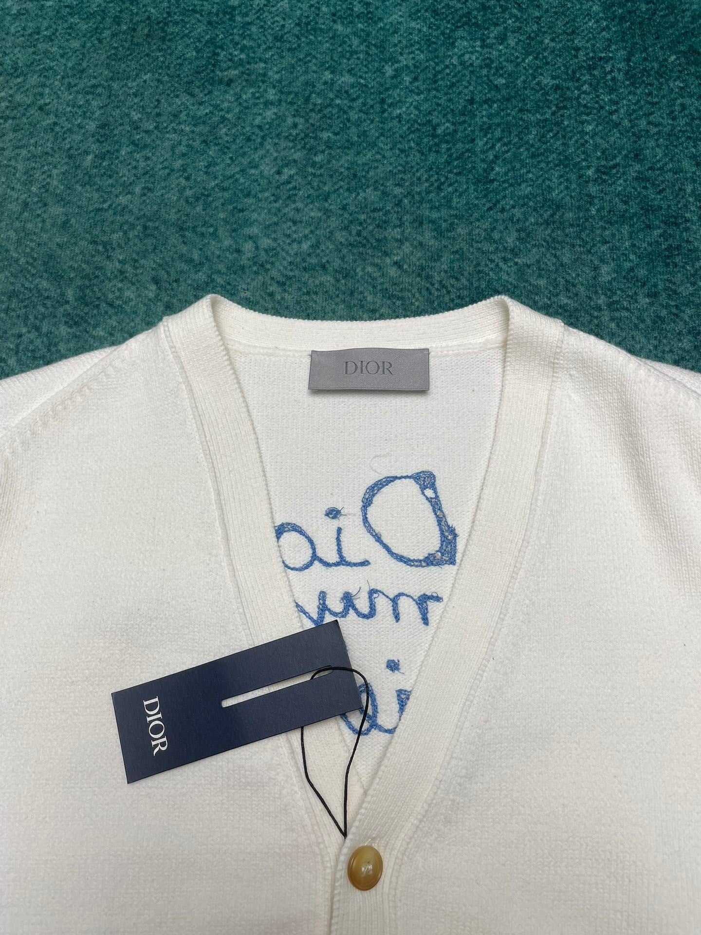 SCRIPT BACK PRINT KNIT SWEATER