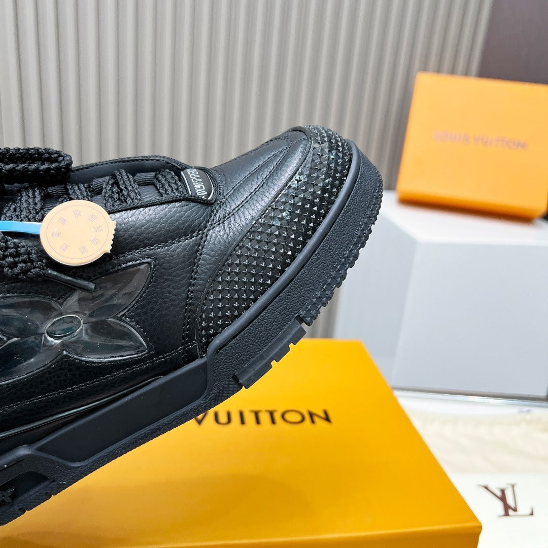 BLACK LEATHER PLATFORM SNEAKERS WITH TRANSLUCENT FLOWER DETAIL