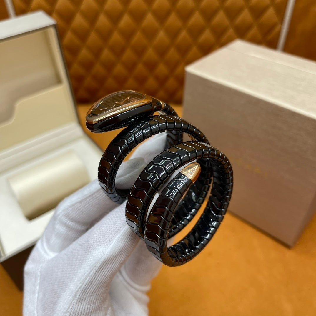 SERPENT WRAP WATCH – BLACK & GOLD ELEGANCE