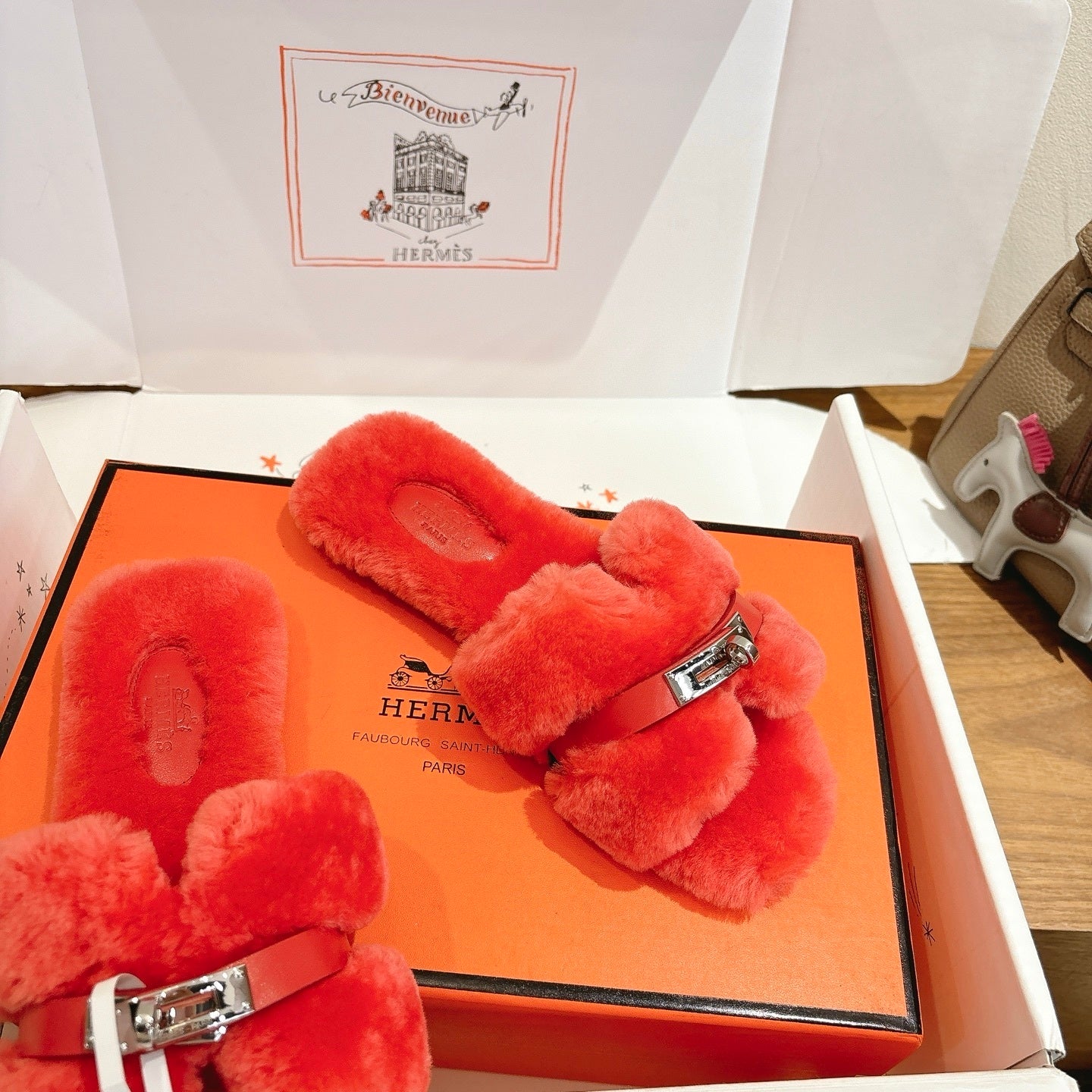 CORAL FAUX FUR MULE SLIPPERS WITH SILVER-TONE ACCENT