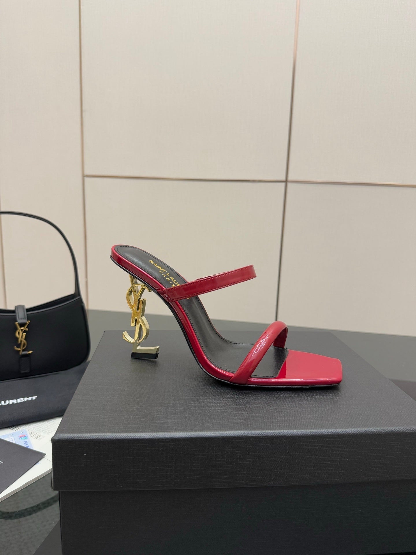 GLOSSY RED STRAPPY HEELS WITH GOLD LOGO HEEL