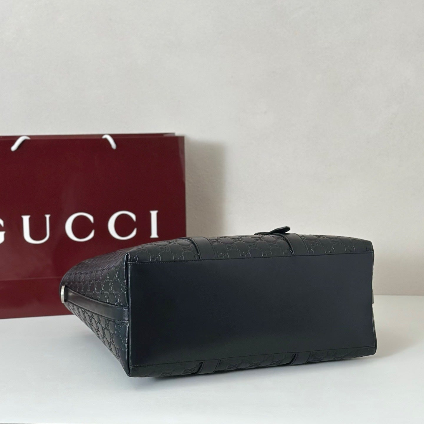 EMBOSSED LEATHER TOTE BAG