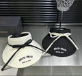 TEXTURED SUN VISOR WITH ADJUSTABLE TIE DETAIL