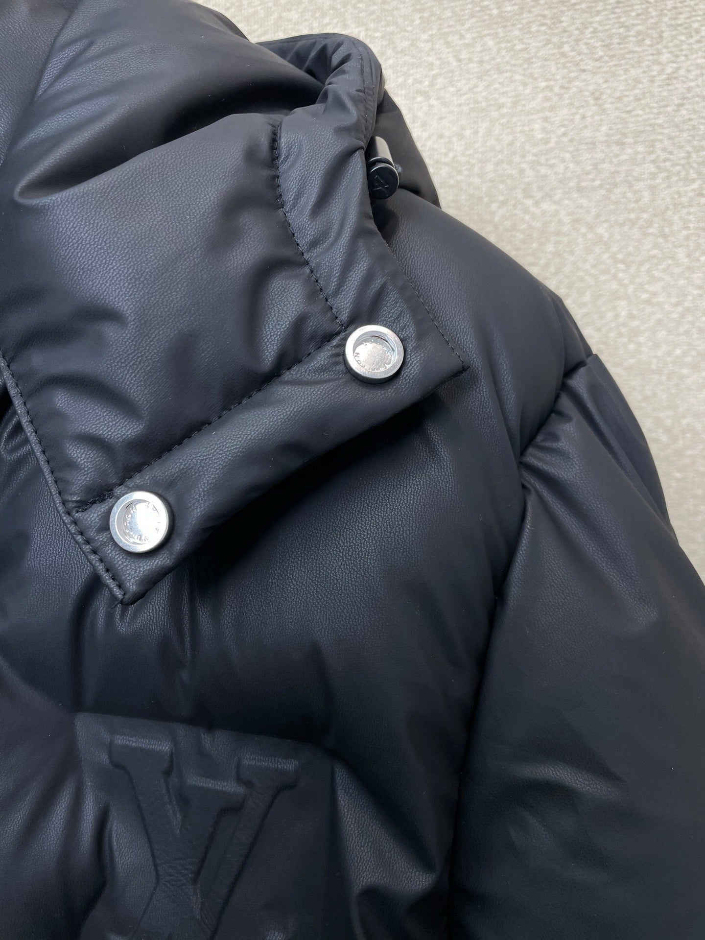 PUFFER JACKET WITH EMBOSSED GEOMETRIC PATTERN