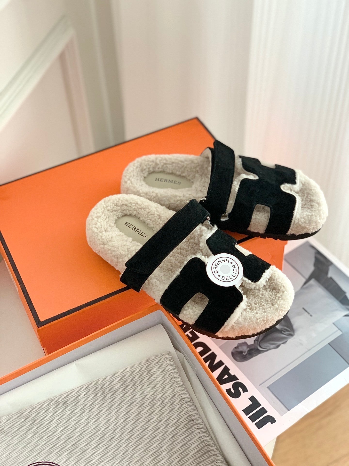 SHEARLING SLIDE SANDALS WITH BLACK STRAPS